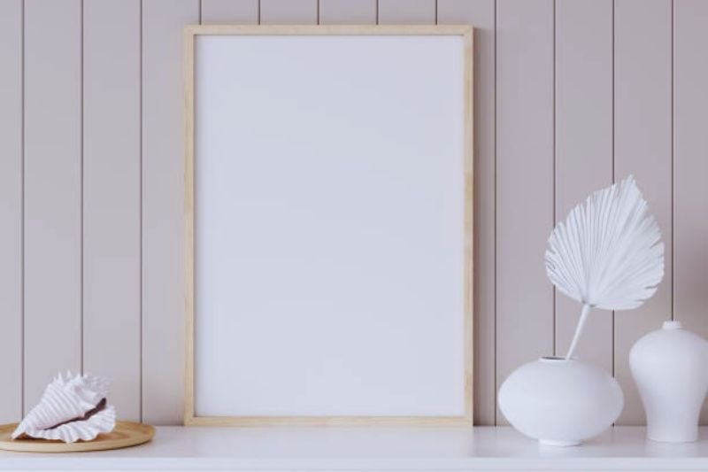 shadow box display on wall in small bedroom