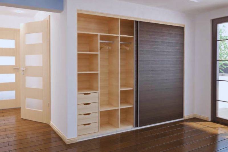 sliding barn door closet in small mens bedroom