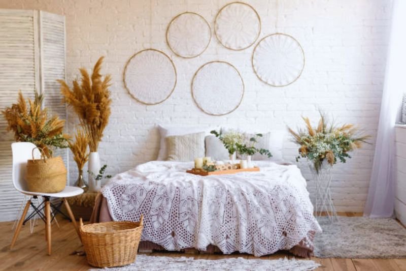 woven basket cluster on wall in small bedroom