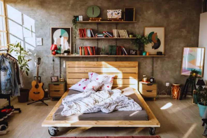 DIY plywood platform on casters sliding out from under bed