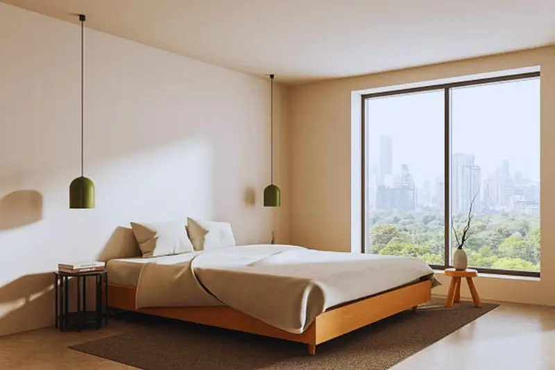centered bed with matching nightstands in small couples bedroom