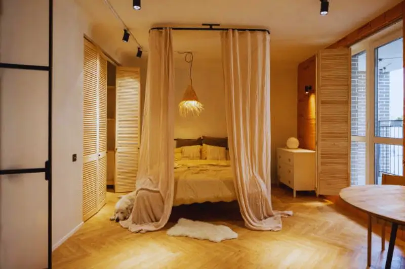 raised bed with curtain hiding storage underneath
