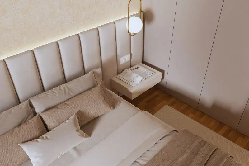tall upholstered headboard in boucle in small couples bedroom