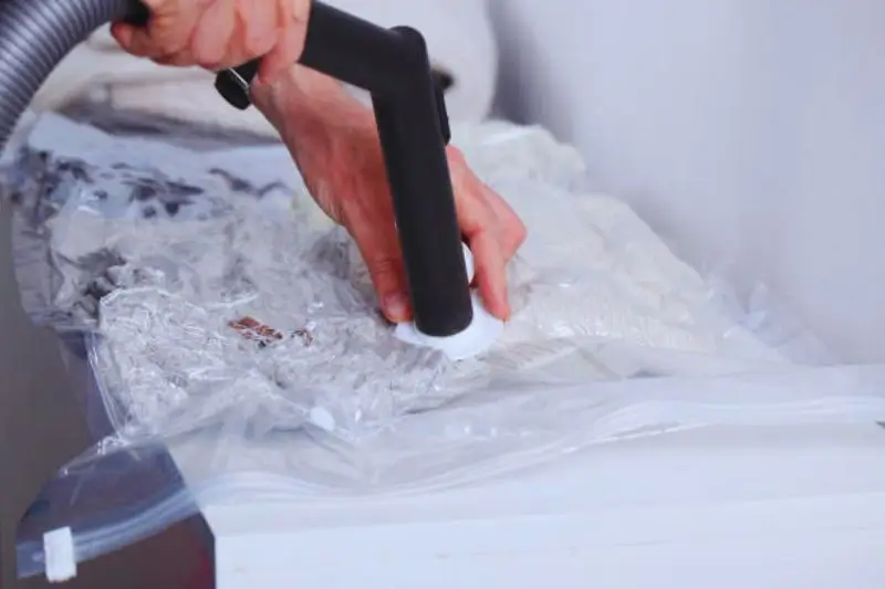 vacuum compression bag with comforter flat under bed